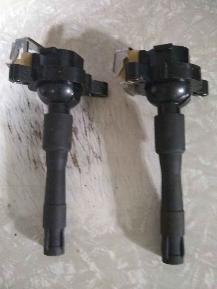 12 bad ignition coil symptoms (& replacement cost)
